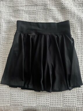 OQQ Black skirt with shorts. NWOT.